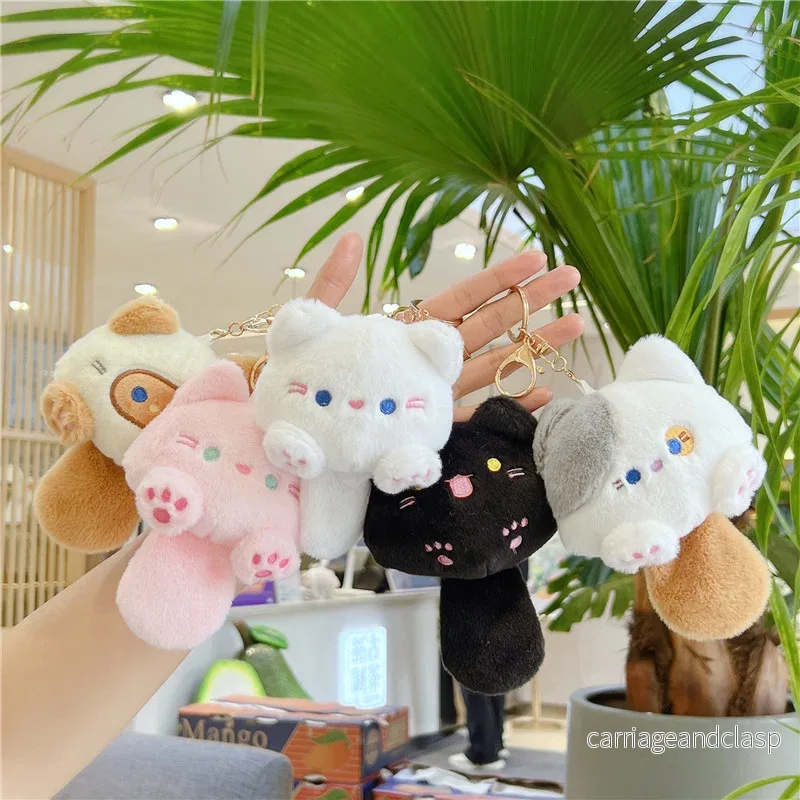 Söt kattnyckelring med plysch och pipsvans – kawaii accessoar Söt kattnyckelring med plysch och pipsvans – kawaii accessoar