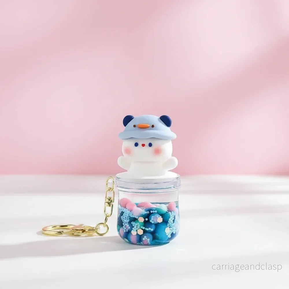 Nyckelring Kawaii Nalle med Blå Hatt och Färgglada Kulor – Söt Accessoar Nyckelring Kawaii Nalle med Blå Hatt och Färgglada Kulor – Söt Accessoar