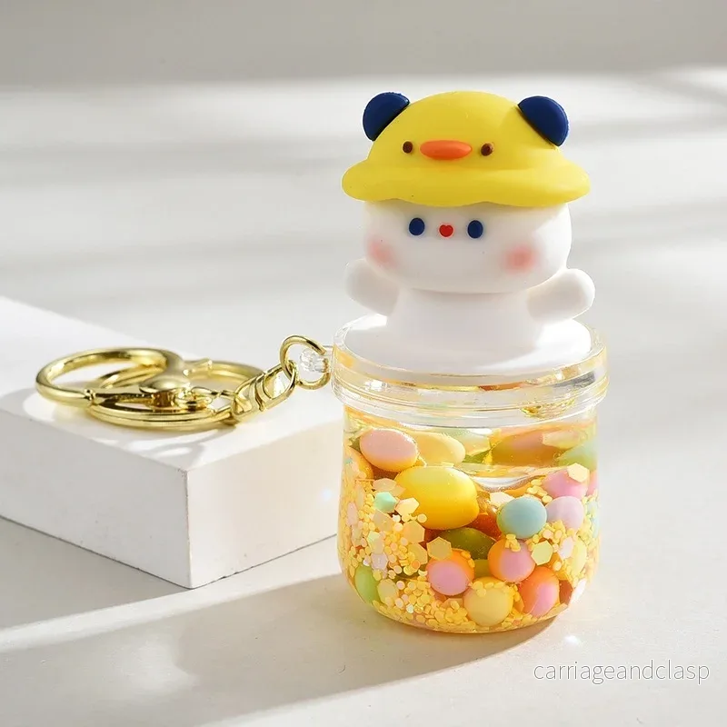 Nyckelring Kawaii Nalle med Gul Hatt och Färgglada Kulor – Söt Accessoar Nyckelring Kawaii Nalle med Gul Hatt och Färgglada Kulor – Söt Accessoar