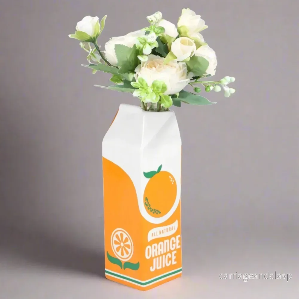 Keramisk vas med apelsinjuice | Veska