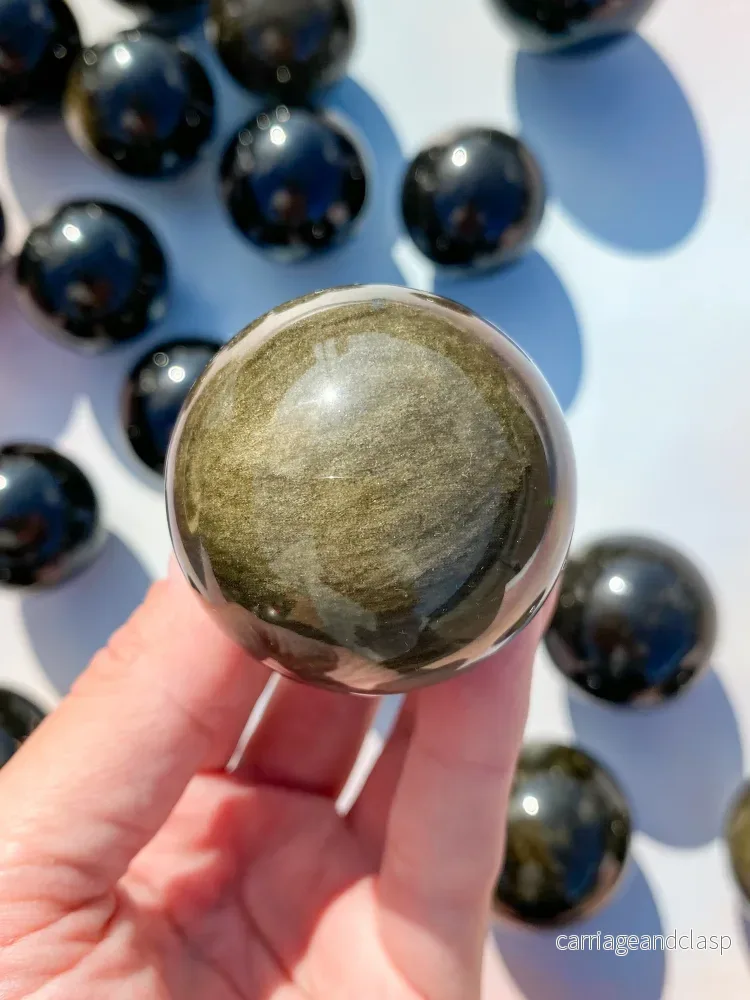 Guld Obsidianboll